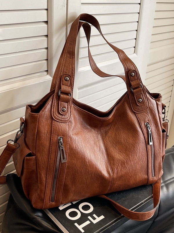 Borsa tote alla moda con rivetti di alta gamma e grande capacità