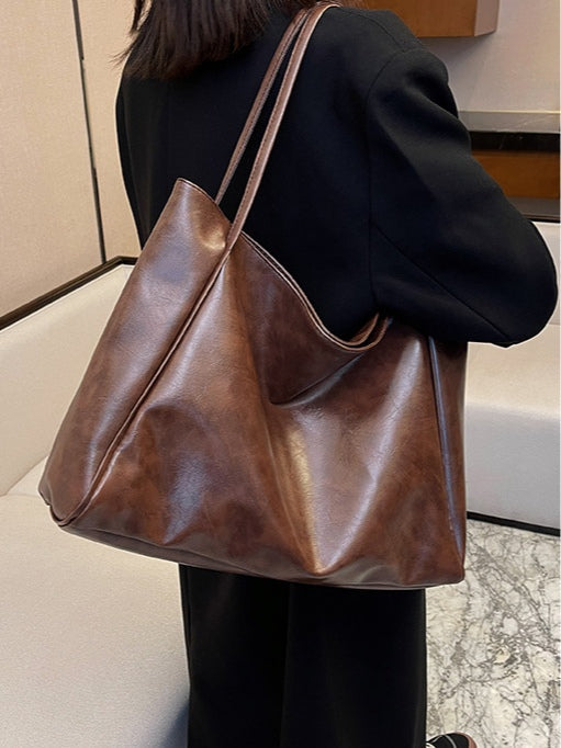 Borsa a secchiello in pelle morbida di grande capacità